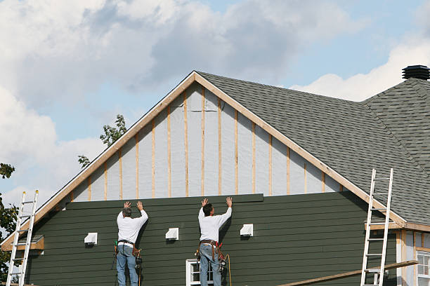 Professional Siding technician working in Creekside, PA